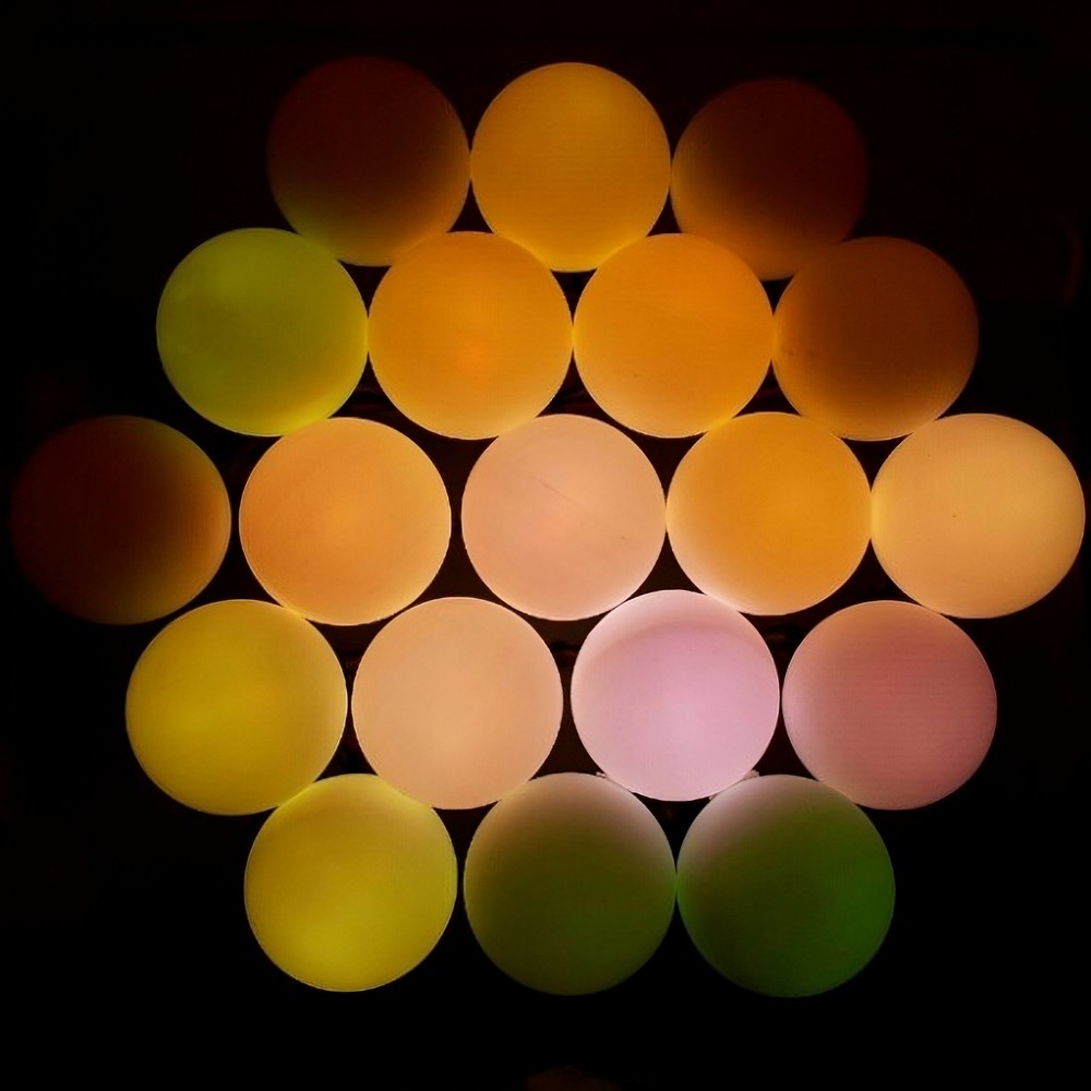 A matrix of coloured LEDs in a hexagon